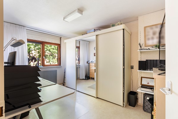 Foto - Te koop: Goed onderhouden tussenwoning in rustige woonwijk!